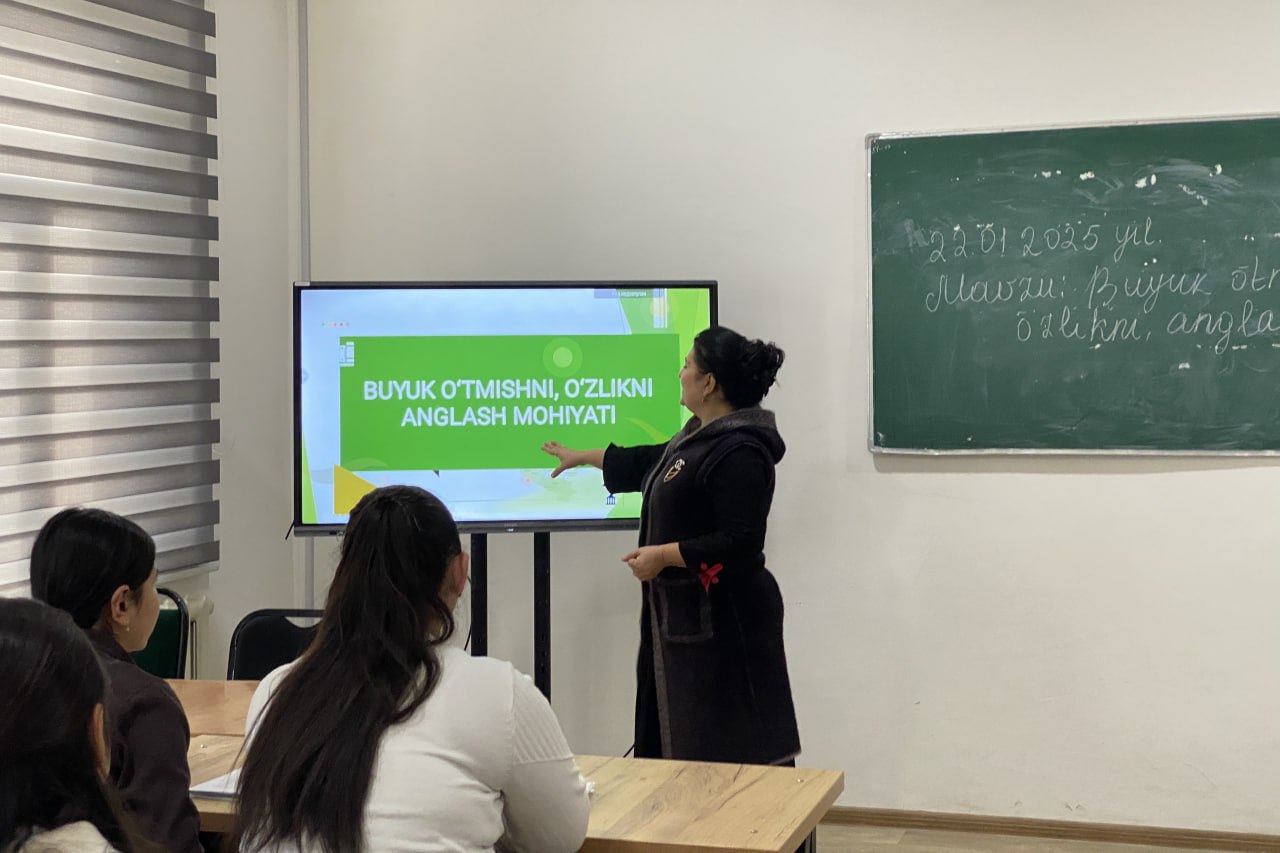 With students in a group assigned to them by group coaches at the university